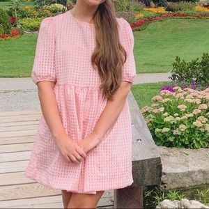 Pink mini dress with puff sleeves